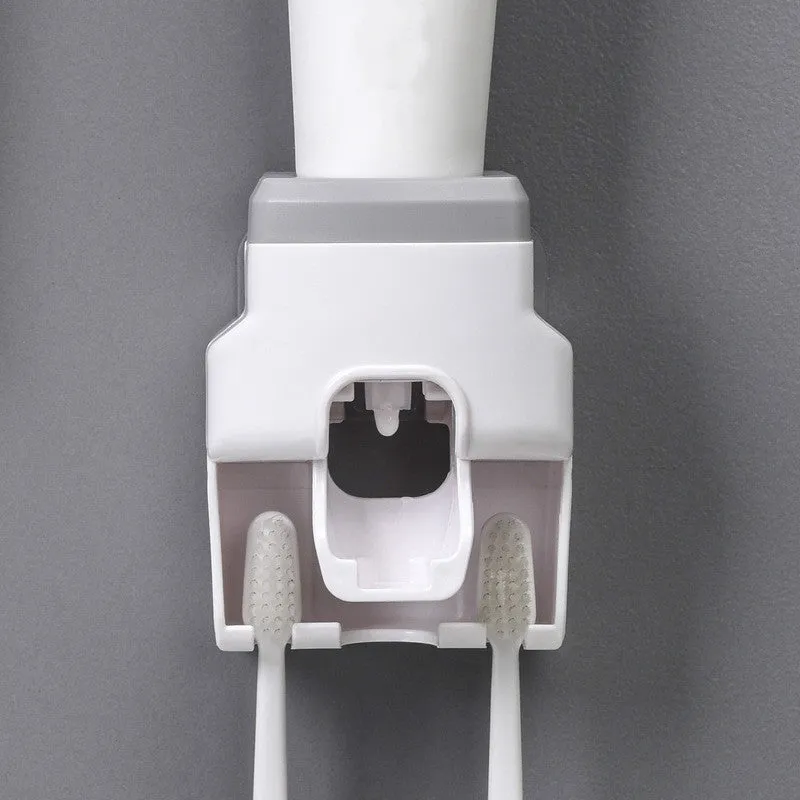 Automatic toothpaste squeezing toothbrush holder